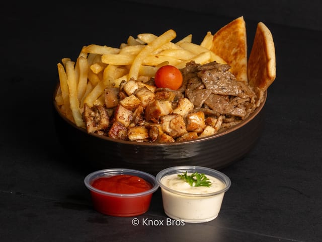 Mixed Meat Fries Over Rice.